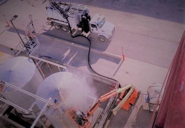 Enviro-Dyne crew hydroblasting process tanks during a scheduled ethanol outage